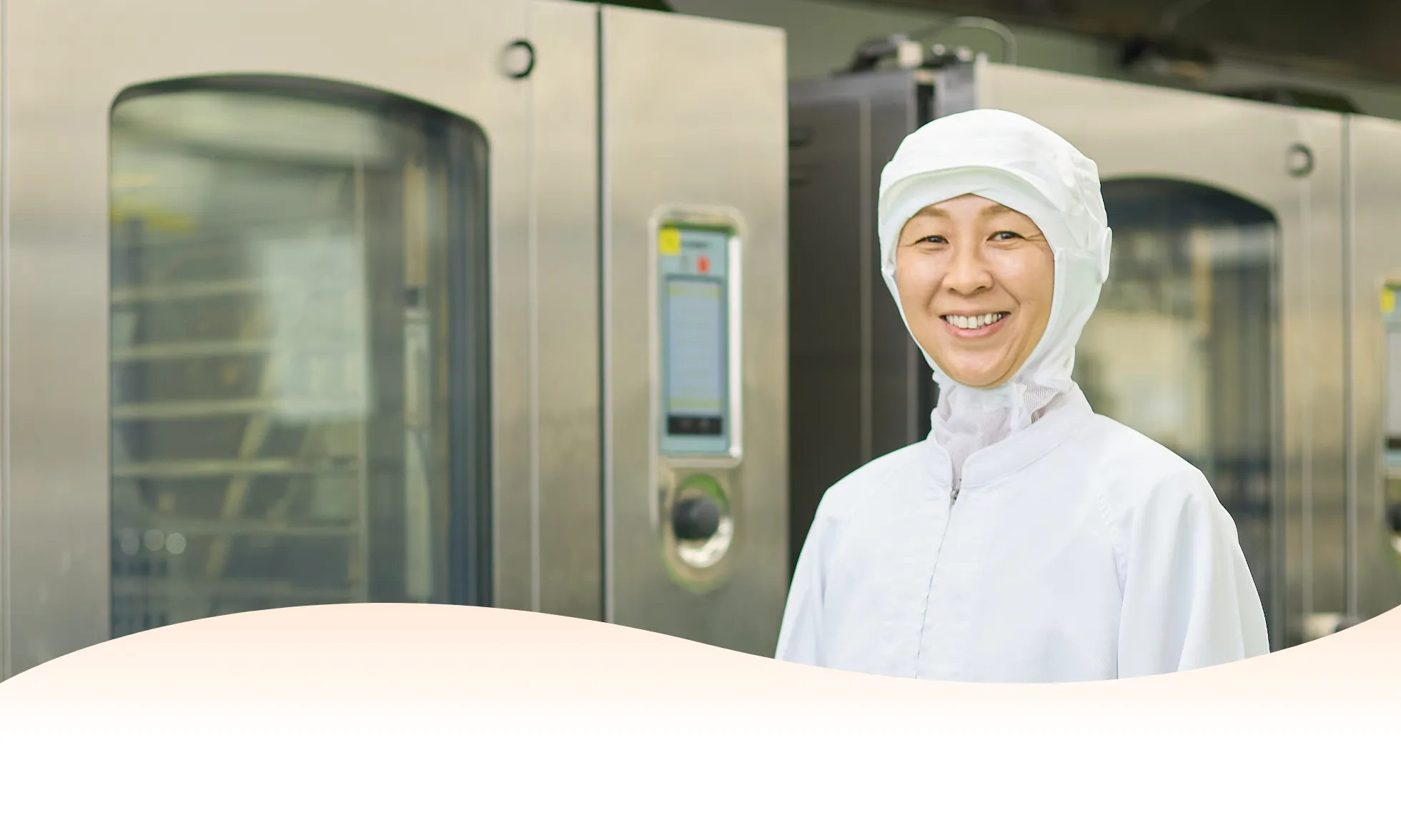 調理場で笑顔のA.K.さん